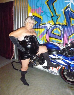 19 year old girl Sabrina G stands naked after removing crotchless bodystocking